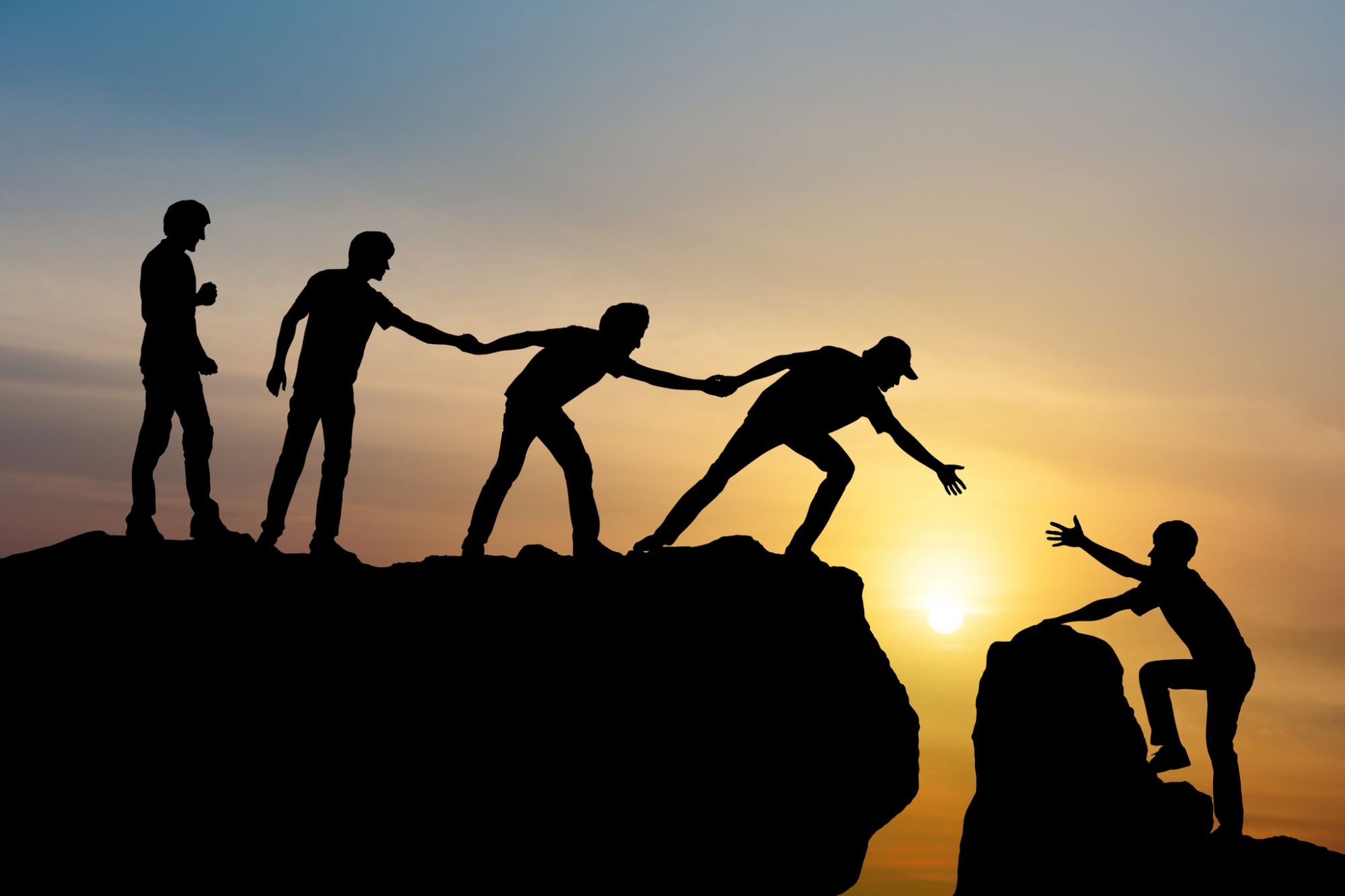 People working together to help someone