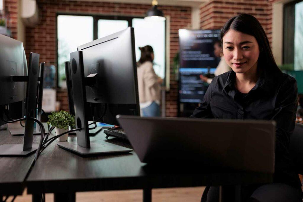 Tech worker using computer.